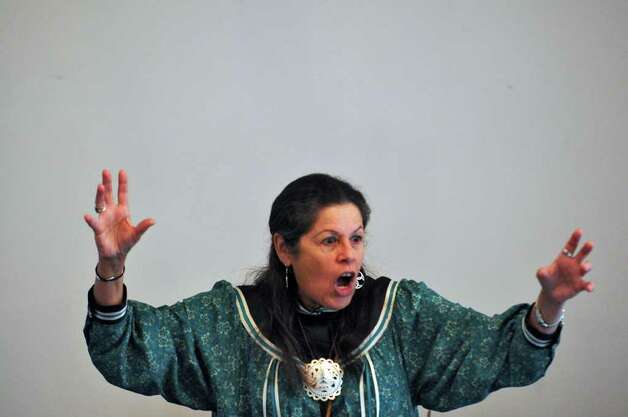 Kay Olan, of the Mohawk Nation, tells a scary tale Sunday as part of an Iroquois cultural presentation during Native New York Family Day at Brookside Museum in Ballston Spa. The storyteller lives in Saratoga Springs. ( Philip Kamrass / Times Union )