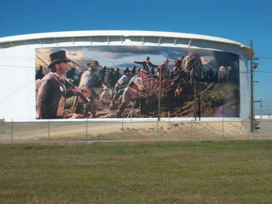 HISTORICAL EVENT: A mural depicting General Sam Houston and a squad of men during the Battle of San Jacinto has been painted onto an oil storage tank near Beltway 8 along Hwy 225.