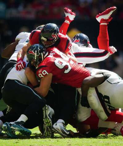 Jacksonville Jaguars quarterback Blaine Gabbert 11 is slammed