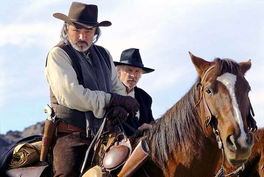b For , Datebook ; Academy Award� nominees Burt Reynolds (left) and Bruce Dern (right) star in the Hallmark Channel Original movie event, "Hard Ground," premiering Saturday, July 12 (9/8c).� Reynolds plays a legendary bounty hunter who forms a reluctant truce with the sheriff (Dern) who jailed him to track down a gang of killers ; Photo credit: Hallmark Channel ; on 6/18/03 in . / Hallmark Channel