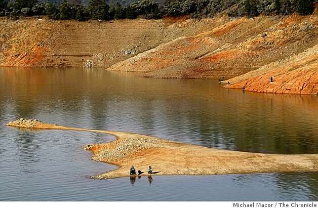 In this 2009 file photo, the water level sits at 71 feet below normal at Shasta Lake in Northern California. A new state report stated Californians will have to deal with worsening droughts in the coming decades as a result of climate changes. Photo: Michael Macor, The Chronicle