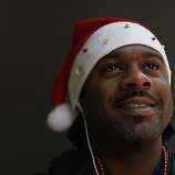 Myron Tate, of San Francisco, shows off his Santa Hat on Tuesday, Dec - square_gallery_thumb