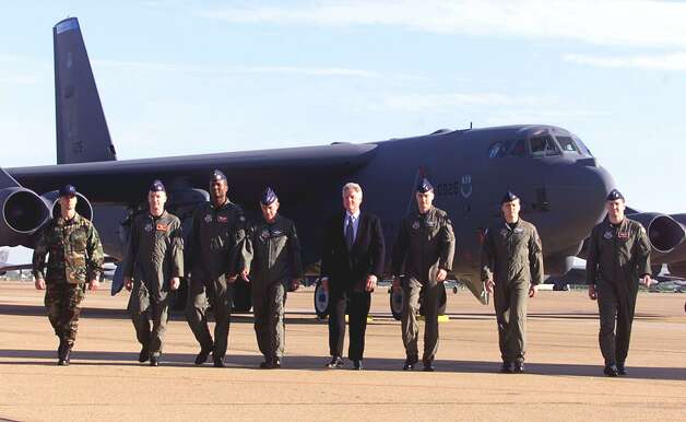 Then President Bill Clinton walks with members of the 2nd Bomb Wing in front of a B-52 bomber at Barksdale Air Force Base in Louisiana on April 12, 1999. Clinton was showing his support for the crisis in Kosovo. Photo: STEPHEN JAFFE, STEPHEN JAFFE/AFP/Getty Images / AFP