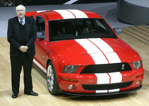 Caroll Shelby stands next to the 2006 Ford Shelby Cobra GT500 at the Auto