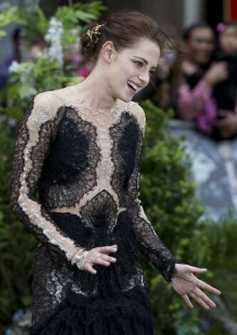 Kristen Stewart Ugly on Actress Kristen Stewart Reacts As She Poses For The Media At The World
