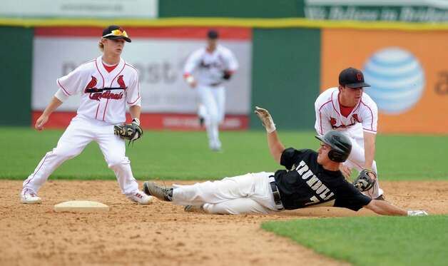 Greenwich's Dylan Callahan reaches to tag Trumbull's Ryan Fritz at second base during Saturday's FCIAC baseball championship game at the Ballpark at Harbor Yard in Bridgeport on May 26, 2012. Photo: Lindsay Niegelberg / Stamford Advocate