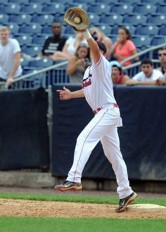 Greenwich's Kyle Ballone makes a catch at first base during Saturday's FCIAC baseball championship game at the Ballpark at Harbor Yard in Bridgeport on May 26, 2012. Photo: Lindsay Niegelberg / Stamford Advocate