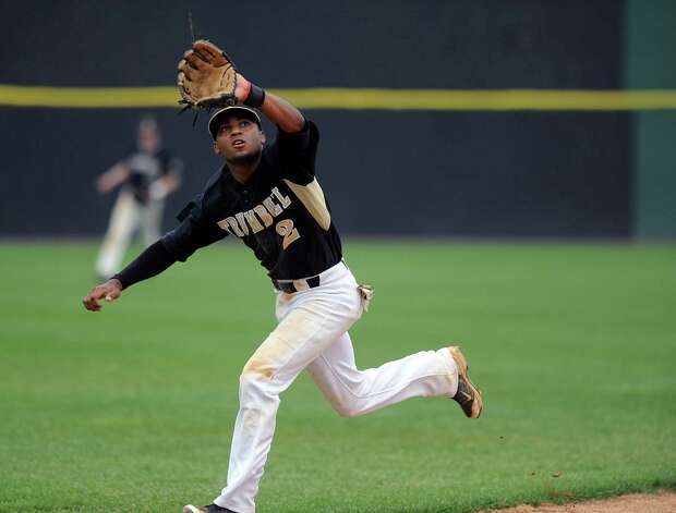 Trumbull's Marcus Jenkins makes a catch in the infield during Saturday's FCIAC baseball championship game at the Ballpark at Harbor Yard in Bridgeport on May 26, 2012. Photo: Lindsay Niegelberg / Stamford Advocate