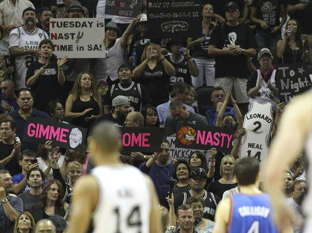 Fans hold up signs during the first half of game two of the NBA Western Conference Finals in San Antonio, Texas on Tuesday, May 29, 2012. Kin Man Hui/Express-News (Kin Man Hui / San Antonio Express-News) / SA