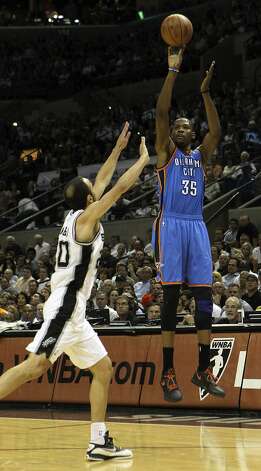 Oklahoma City Thunder's Kevin Durant (35) shoots over San Antonio Spurs' Manu Ginobili (20) during the first half of game two of the NBA Western Conference Finals in San Antonio, Texas on Tuesday, May 29, 2012. Kin Man Hui/Express-News (Kin Man Hui / San Antonio Express-News) / SA