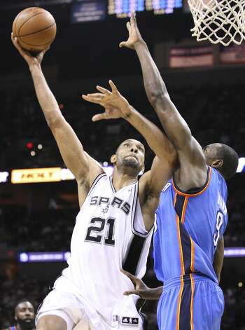 San Antonio Spurs' Tim Duncan (21) shoots against Oklahoma City Thunder's Serge Ibaka (9) during the first half of game two of the NBA Western Conference Finals in San Antonio, Texas on Tuesday, May 29, 2012. Edward A. Ornelas/Express-News (Edward A. Ornelas / San Antonio Express-News) / SA