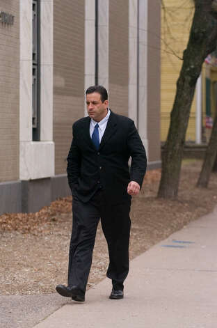 Mark Mansa walks to his hearing at the Abraham A. Ribicoff Federal Building and Courthouse in Hartford on Friday, Dec. 30, 2011. Mansa pleaded guilty to one count of conspiracy to distribute marijuana in excess of 100 kilograms between 2007 and 2011. On Friday he was sentenced to 46 months in prison. Photo: Jason Rearick / The News-Times
