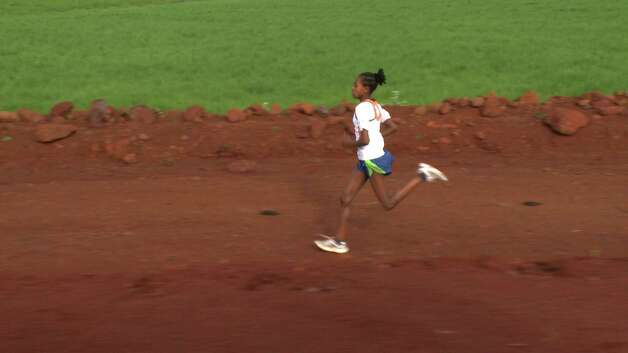 Hawii is one of the young people featured in "Town of Runners," a new documentary about the rural Ethiopian village of Bekoji, whose runners have won
8 Olympic Gold medals, 32 World Championships and
broken 10 world records in the last 20 years. Hawii hopes to be as successful as her sister, who runs in the United States. Photo: Courtesy Of Dogwoof / HC