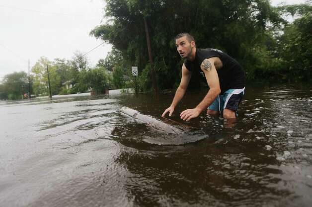 Rescues continue as Isaac floods parts of La. - San Antonio Express-