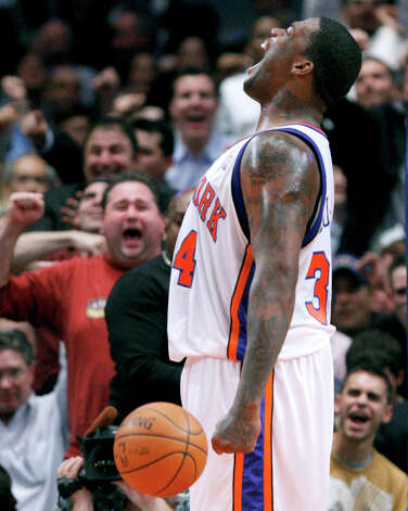 The New York Knicks' Eddy Curry reacts after drawing a foul while scoring against the Denver Nuggets in the fourth quarter Tuesday, Nov. 6, 2007, at Madison Square Garden in New York. Curry scored 24 points in the game and the Knicks won 119-112. (Julie Jacobson / Associated Press) Photo: Julie Jacobson, AP / AP