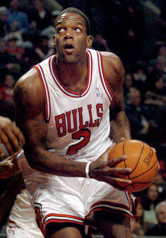 The Chicago Bulls' Eddy Curry heads to the basket during a preseason game against the New Orleans Hornets, Oct. 15, 2004, in Chicago. (Jeff Roberson / Associated Press) Photo: JEFF ROBERSON, AP / AP