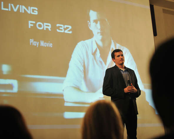 Colin Goddard, survivor of the April 16, 2007 shooting the killed 32 people at Virginia Tech University, discusses the documentary, Living for 32, at the University of Bridgeport on Monday, November 12, 2012. Goddard was shot four times in the incident. Photo: Brian A. Pounds / Connecticut Post