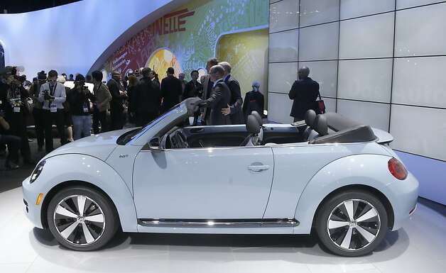Volkswagen Beetle convertible is shown during its world debut at the LA Auto Show in Los Angeles, Wednesday, Nov. 28, 2012. The annual Los Angeles Auto Show opened to the media Wednesday at the Los Angeles Convention Center. The show opens to the public on Friday, November 30. (AP Photo/Chris Carlson) Photo: Chris Carlson, Associated Press / SF