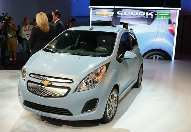 The 2013 Chevrolet Spark EV all electrical car is unveiled at the Los Angeles Auto Show in Los Angeles, California on media preview day, November 28, 2012. The Spark is Chevrolet's first all electric car. The LA Auto Show will open to the public on November 30 and runs through December 9. Photo: Robyn Beck, AFP/Getty Images / SF
