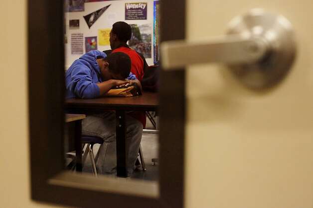 Students in a manhood development class at Oakland High School wait for the bell to ring on Nov. 27. The school district has instituted programs to help males of color succeed. Photo: Lacy Atkins, The Chronicle / SF