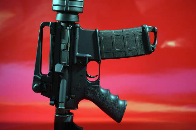 A pistol grip and detachable magazine are two of the features commonly used to define an "assault weapon."
The magazine shown above is from a manufaturer called MagPul, which describes the lopped baseplate attachement on the bottom of the magazine to as a device to provide "unsurpassed speed and controllability during high stress, tactical magazine changes."
Such assessories, while designed for military and tactical applications, are commonly sold and marketed to civilians. Photo: Joe Raedle, Getty Images / 2012 Getty Images