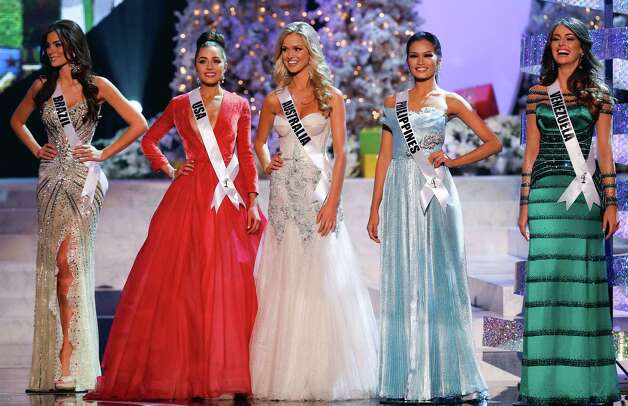 The final five contestants, from left, Miss Brazil, Gabriela Markus; Miss USA, Olivia Culpo; Miss Australia, Renae Ayris; Miss Philippines, Janine Tugonon; and Miss Venezuela, Irene Sofia Esser Quintero; stand together during the Miss Universe competition  in Las Vegas, Wednesday, Dec. 19, 2012. Photo: AP / SL
