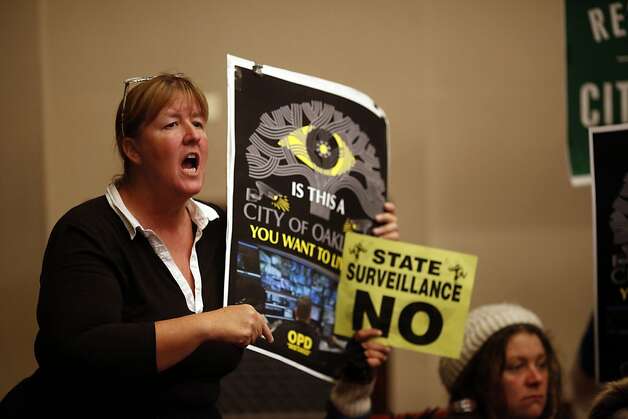 Mindy Stone reacts after the City Council voted yes on the Domain Awareness Center during a city council meeting at the Oakland City Hall in Oakland, Calif. on July 30, 2013. Photo: Ian C. Bates, The Chronicle