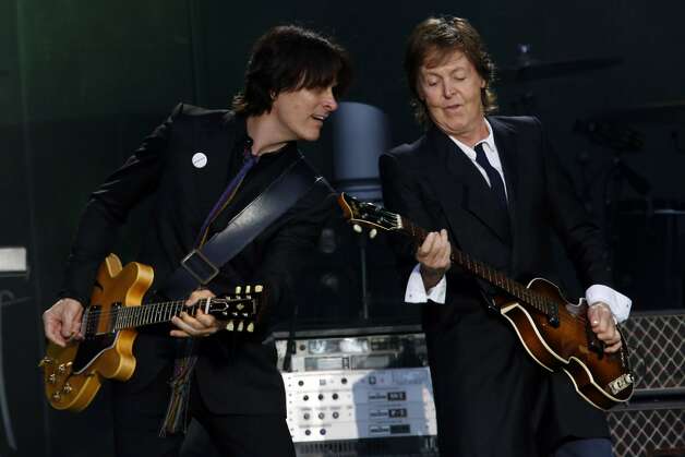 Paul McCartney, right, plays guitar with bandmate Rusty Anderson, left, on the Lands End stage during the first day of the Outside Lands music festival in Golden Gate Park in San Francisco, Calif. on August 9, 2013. Photo: Ian C. Bates, The Chronicle
