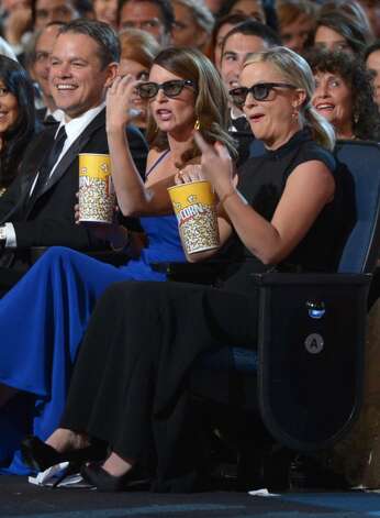 Matt Damon, Tina Fey and Amy Poehler in the audience at the 65th Primetime Emmy Awards at Nokia Theatre on Sunday Sept. 22, 2013, in Los Angeles. (Photo by Frank Micelotta/Invision for Academy of Television Arts & Sciences/AP Images) Photo: Frank Micelotta/Invision/AP