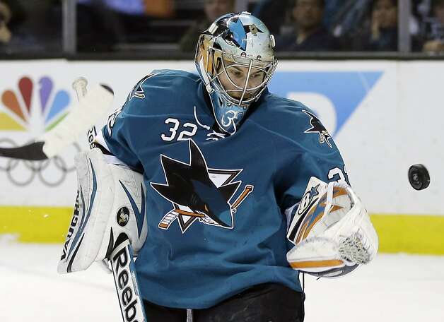 San Jose Sharks goalie Alex Stalock (32) deflects a shot-on-goal against the Los Angeles Kings during the second period of an NHL hockey game on Monday, Jan. 27, 2014, in San Jose, Calif. (AP Photo/Marcio Jose Sanchez) Photo: Marcio Jose Sanchez, Associated Press