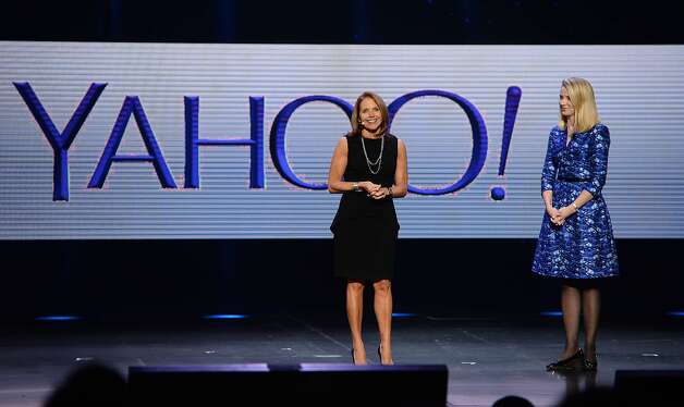 TO GO WITH AFP STORY by Rob LEVER, US-media-industry-IT-Internet (FILES) Katie Couric (L) appears on stage with Yahoo CEO Marissa Mayer during Mayer's keynote address at the 2014 International CES in Las Vegas, Nevada, in this January 7, 2014 file photo. Couric will be Yahoo's 