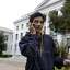 Siddarth Iyer, who says he thinks warning stickers won't make much difference, uses his phone and tablet at UC Berkeley.