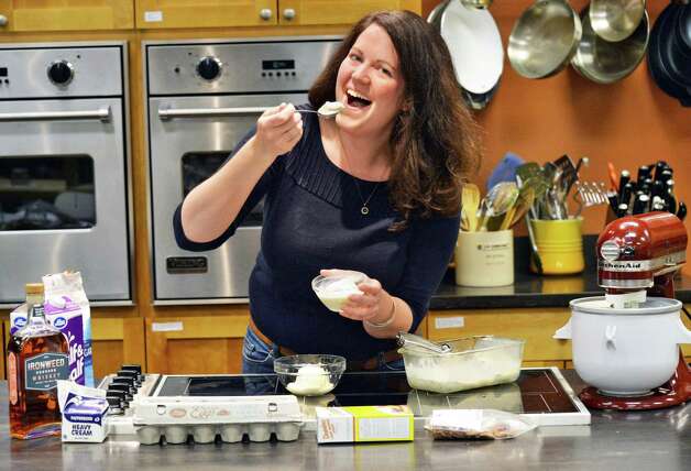 Deanna Fox tastes her homemade ice cream at Different Drummer's Kitchen Thursday July 10, 2014, in Albany, NY.  (John Carl D'Annibale / Times Union) Photo: John Carl D'Annibale / 00027646A