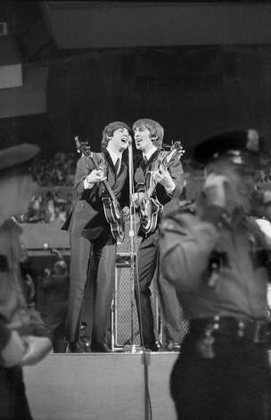 The Beatles play their first concert in Seattle, August 21, 1964 at the Seattle Center Coliseum Photo: Timothy Eagan, MOHAI,  Timothy Eagan Collection / Copyright Timothy Eagan Collection, Museum of History & Industry
