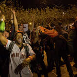 Giants fans celebrate the San Francisco Giants winning the 2014 World Series at the Civic Center.