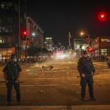 Cops break up the crowds in the in the streets of San Francisco after the Giants won the wold series on October 29th 2014.