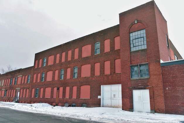 The former Tilley Ladder factory, right, on Second St. Friday Jan. 16, 2015, in Watervliet, NY.  (John Carl D'Annibale / Times Union) Photo: John Carl D'Annibale / 00030244A