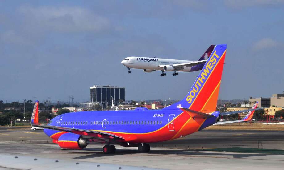 File photo on May 16, 2013 of Southwest Airlines Boeing 737 aircraft. A UC Berkeley student who was removed from a Southwest Airlines plane after a fellow passenger heard him speaking in Arabic on his mobile phone Photo: Robert Alexander, Getty Images / 2013 Robert Alexander