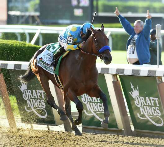 American Pharoah ridden by Victor Espinoza made his way to the record books by winning the 147th running of the Belmont Stakes and thoroughbred racing's Triple Crown June 6, 2015 at Belmont Park in Elmont, N.Y.   (Skip Dickstein/Times Union) Photo: SKIP DICKSTEIN