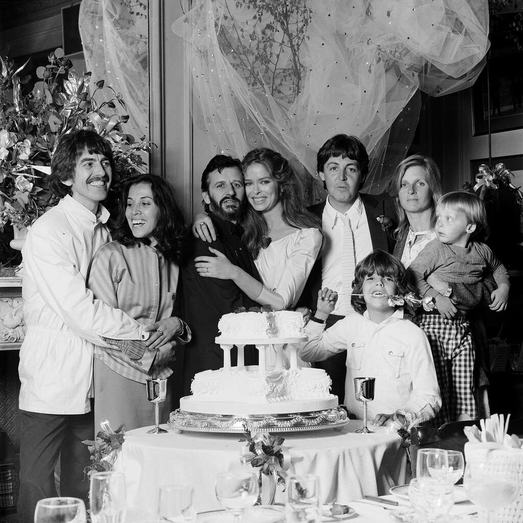 Ringo Starr and Barbara Bach's wedding day, April 27, 1981, with the two other surviving Beatles and their families. Linda McCartney is holding James, her son with Paul McCartney. The other child is Bach's by a previous marriage, Gianni Gregorini. Photo: Terry O'Neill
