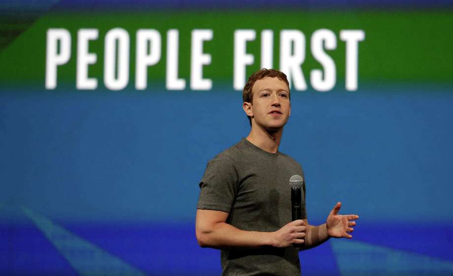 Facebook CEO Mark Zuckerberg gestures while delivering the keynote address at the f8 Facebook Developer Conference in San Francisco.  Photo: Ben Margot, Getty Images / ONLINE_YES