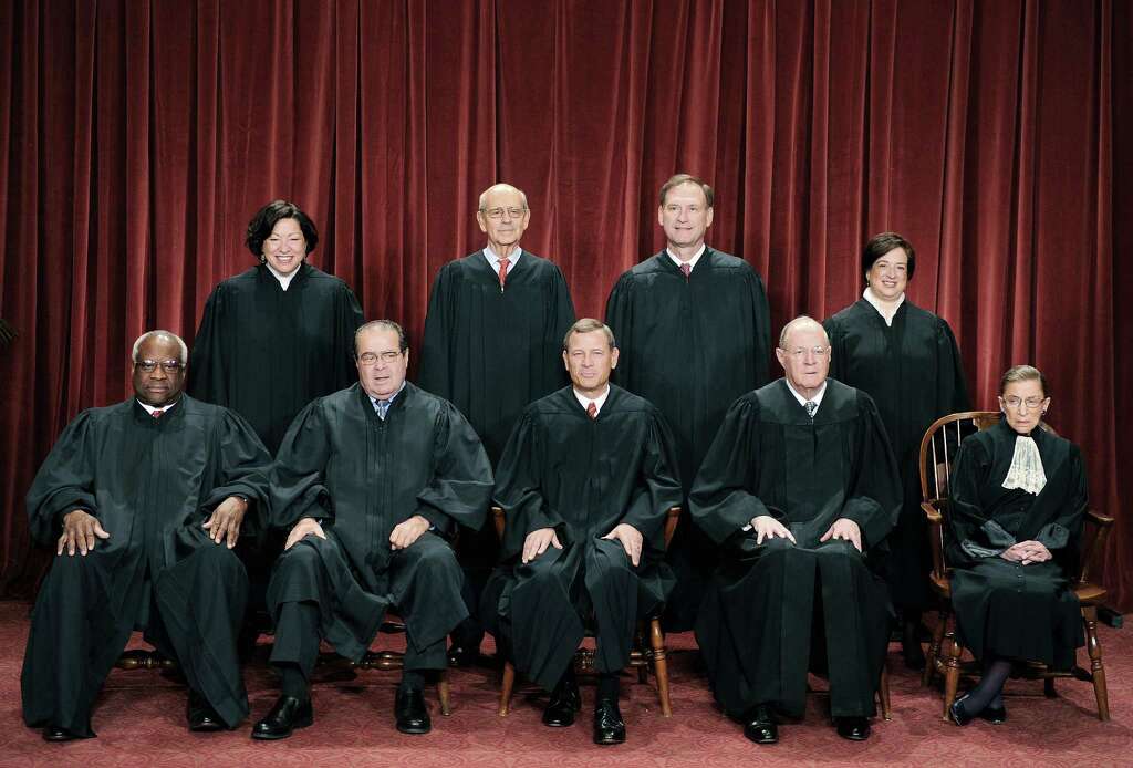 The Justices of the US Supreme Court sit for their official photograph in this file photo. Photo: TIM SLOAN /AFP /Getty Images / AFP ImageForum