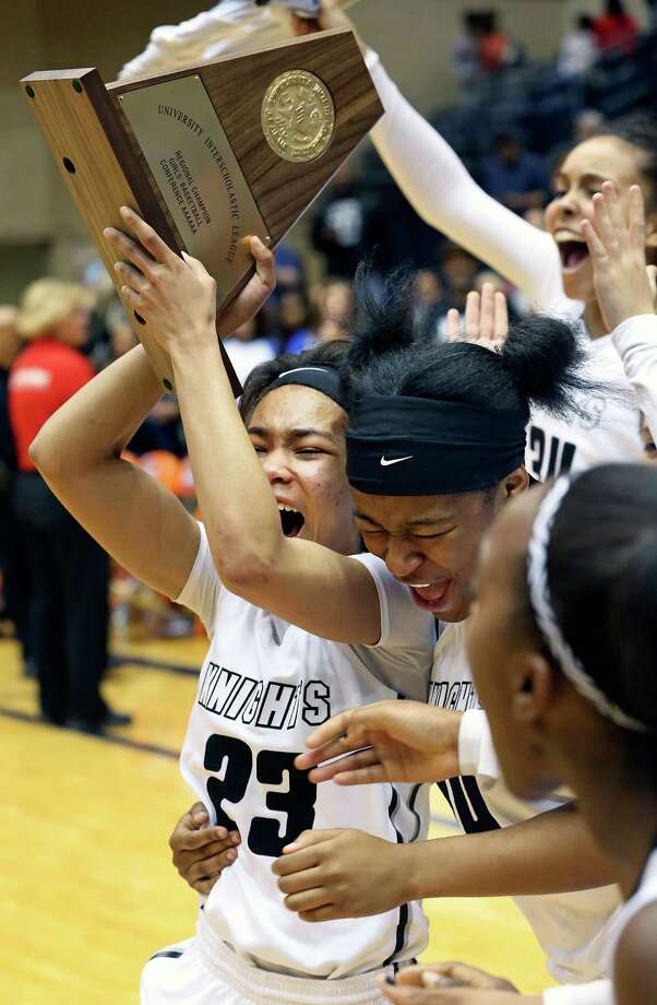 Steele point guard Charisma Shepherd celebrated her 18th birthday by hoisting the trophy after her Knights beat Wagner on Saturday  to win the Region IV-6A championship and advance to the UIL state tournament. “We believed in our minds we could do this,” she said. Photo: Tom Reel / San Antonio Express-News / 2016 SAN ANTONIO EXPRESS-NEWS