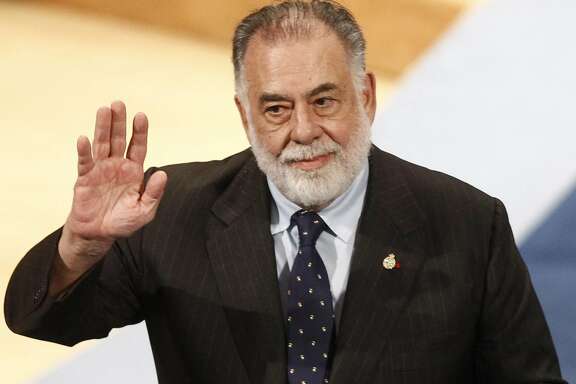 FILE - In this Oct. 23, 2015 file photo, filmmaker Francis Ford Coppola acknowledges applause after receiving the Princess of Asturias Arts award award from Spain's King Felipe VI at a ceremony in Oviedo, northern Spain. Coppola will be honored Friday, April 29, 2016, at the TCM Classic Film Festival.  (AP Photo/Jose Vicente, File)