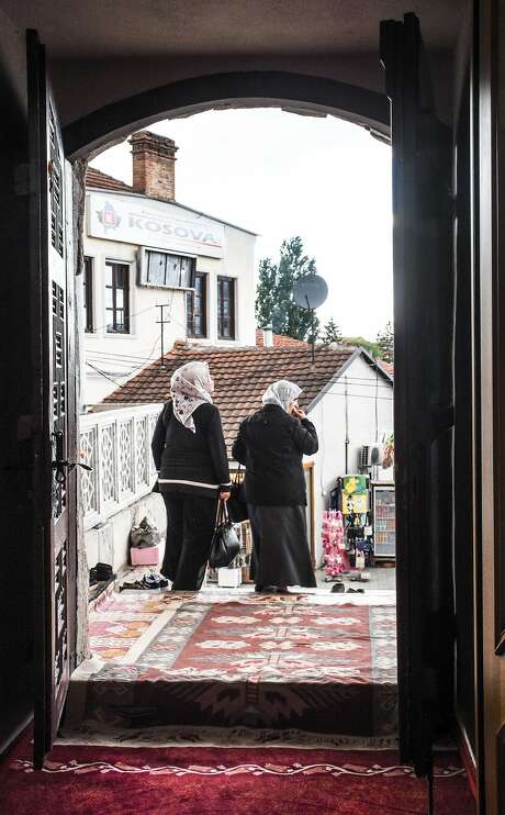 Two women leave a mosque in Prizren in southwest Kosovo. Photo: Margo Pfeiff, Special To The Chronicle