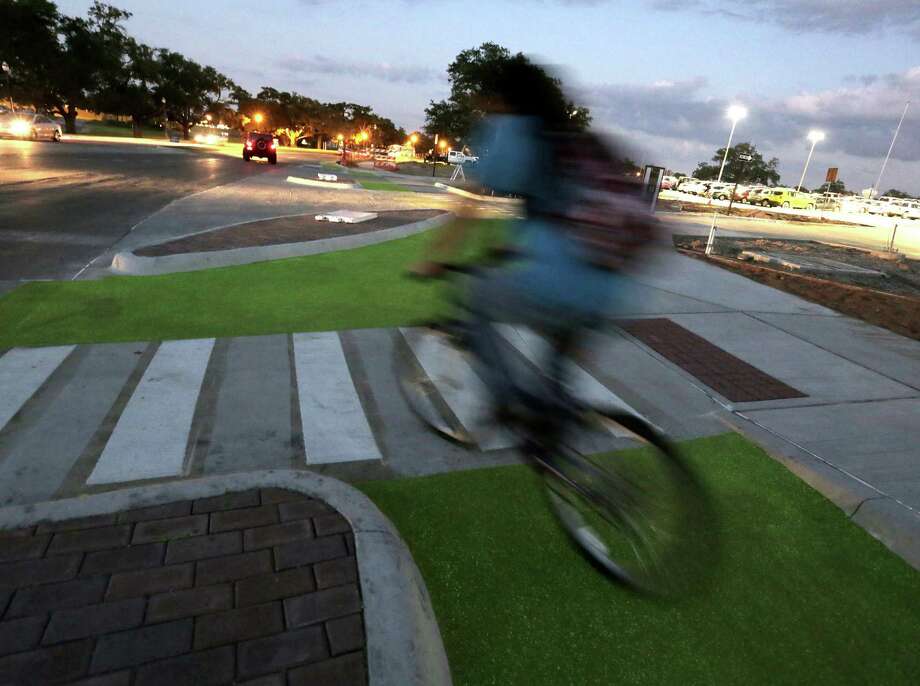 Texas A&amp;M is experimenting with glow-in-the-dark bike lanes and "Dutch junctions" on campus. Photo: Elizabeth Conley, Houston Chronicle / © 2016 Houston Chronicle
