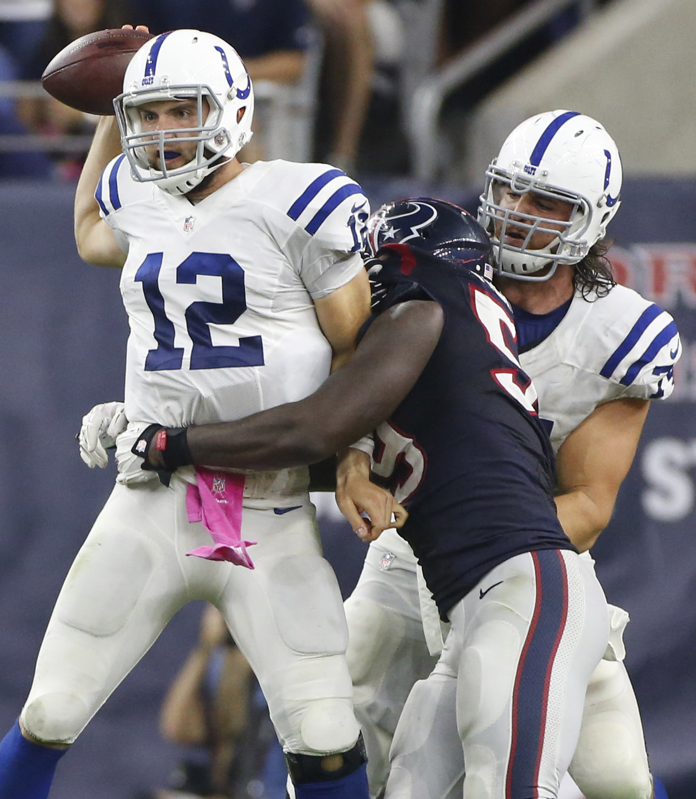 Andrew Luck takes a licking, keeps on ticking