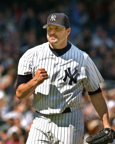 New York Yankees' Roger Clemens pumps his fist in the eighth inning against the Minnesota Twins, Sunday, May 19, 2002 at Yankee Stadium in New York. Photo: KATHY WILLENS, AP
