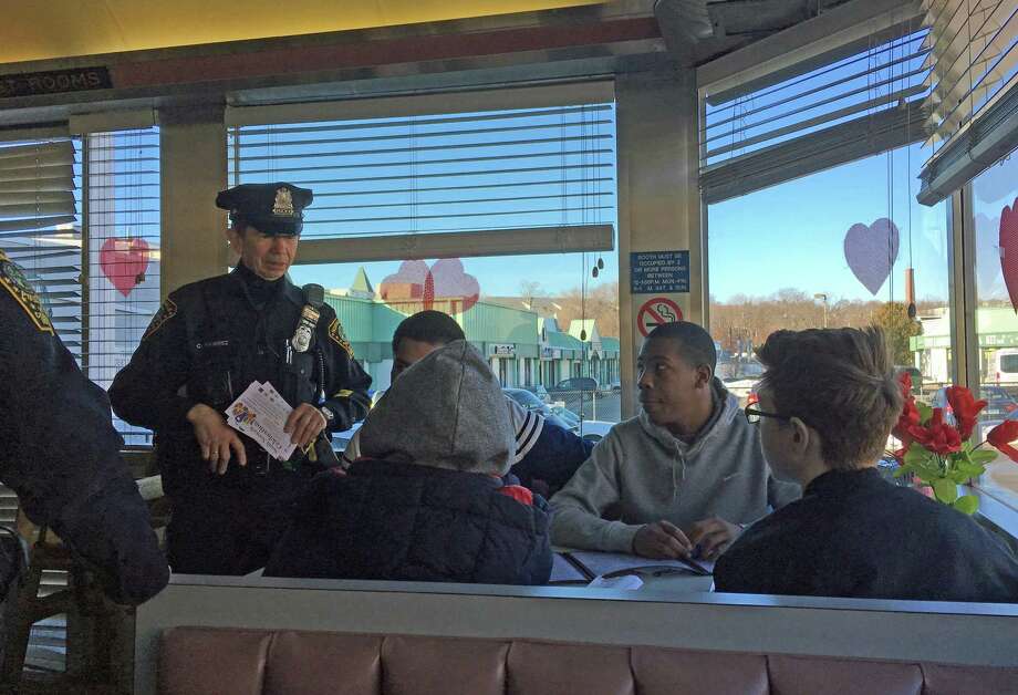 Norwalk police visited with some High Roads School students at the Family Diner as part of the department's Coffee with a Cop program. Photo: Leslie Lake / Hearst Connecticut Media / Norwalk Hour