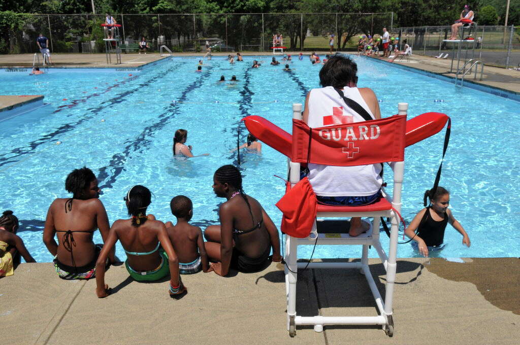 When do public pools usually open and close for the season?